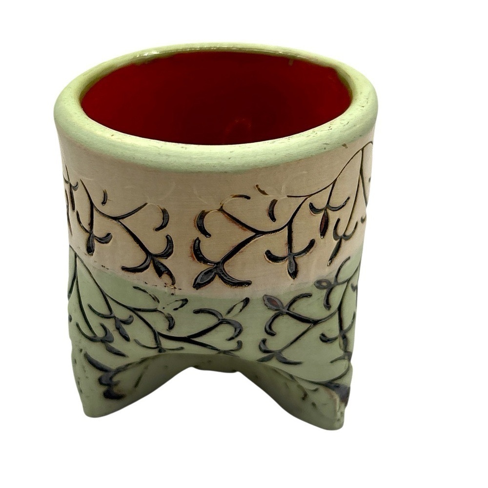 Green succulent planter w/Leaf signature. Red clay 3”x3” a distinct footed base